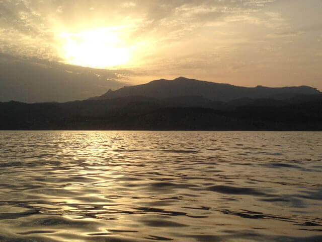 Puesta de sol desde el barco en El Campello